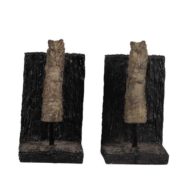 Rustic horse themed bookends.  Horses and supports appear to be carved.  Horses are tan and supports are dark brown.  View from side.  