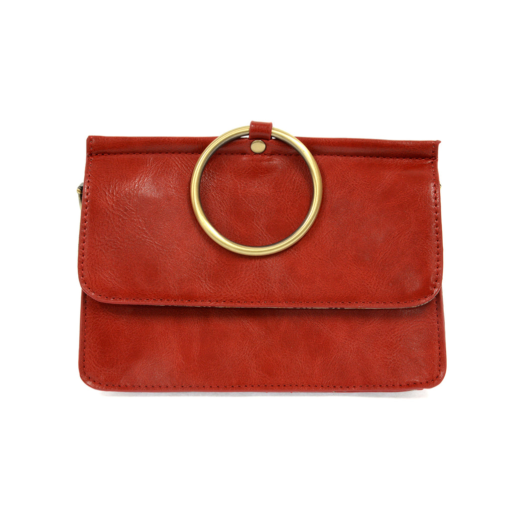 Red leather bag with large metal brass ring