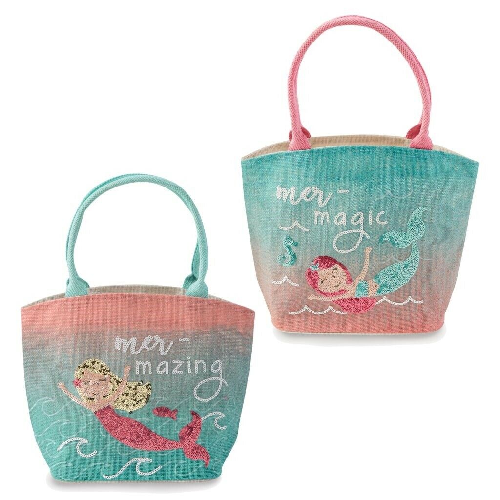 A pair of sequined bags on a white background.  The left bag has blue handles and a pink to blue background with a mermaid swimming amongst waves.  The mermaid is blond with pink tail and is made of sequins.  The text above her reads 'mer-mazing'.  The bag on the right has pink handles and features a blue to pink gradient on the front of the bag.  A red haired mermaid is swimming amongst the waves with a blue seahorse and both of them are made of sequins.  The text above her reads 'mer-magic'