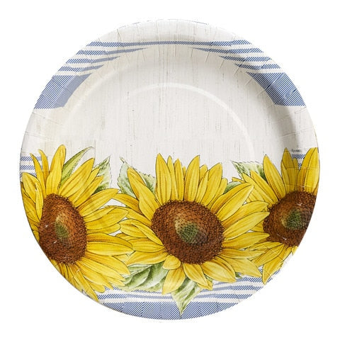 A round white paper plate with a series of blue stripes at the top and bottom of the plate.  The lower half of the plate has three large yellow sunflowers.