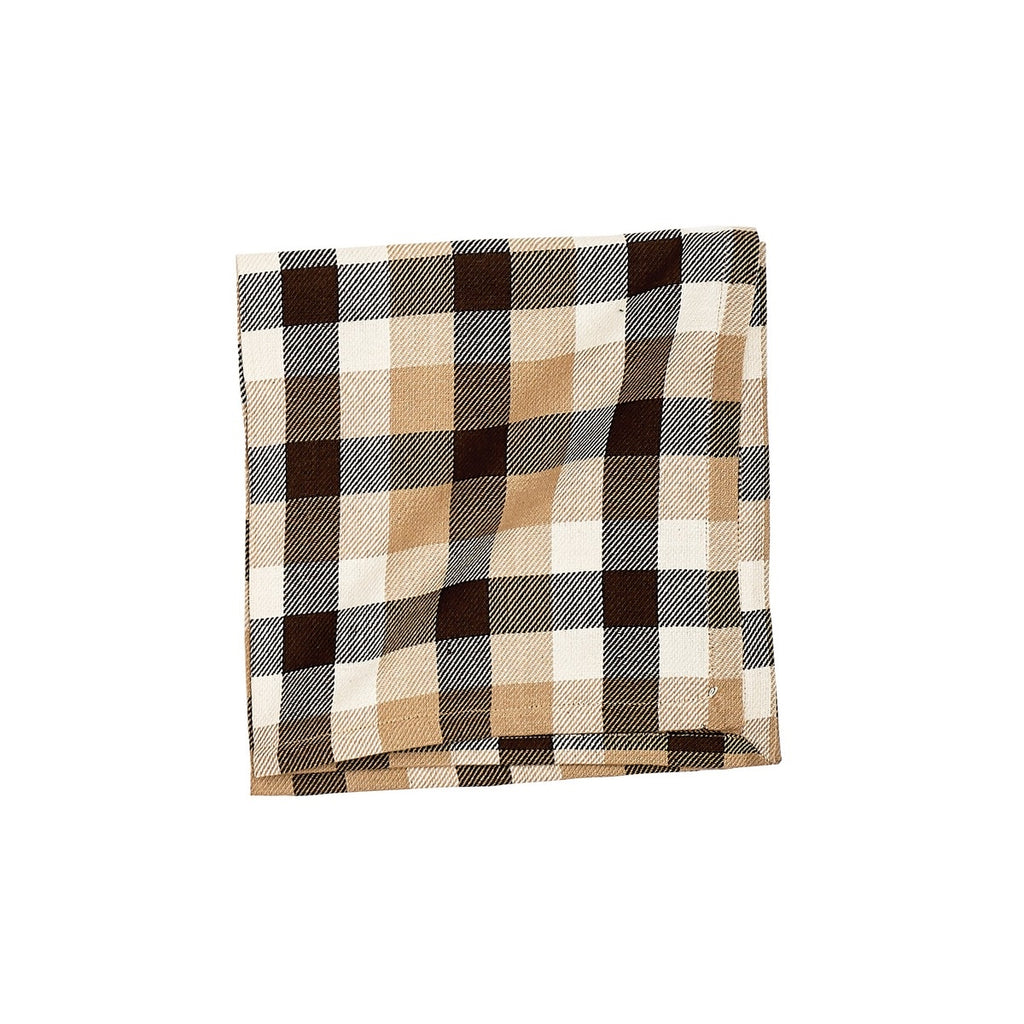 Plaid folded napkin with white, tan and chocolate brown.