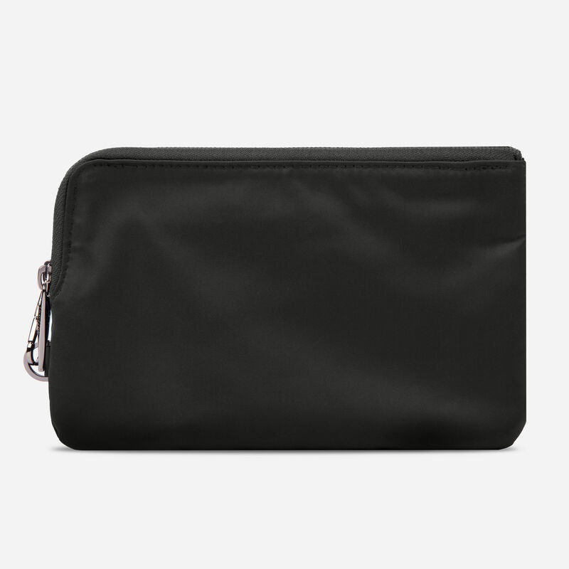 The back view of a black crossbody purse on a white background.  