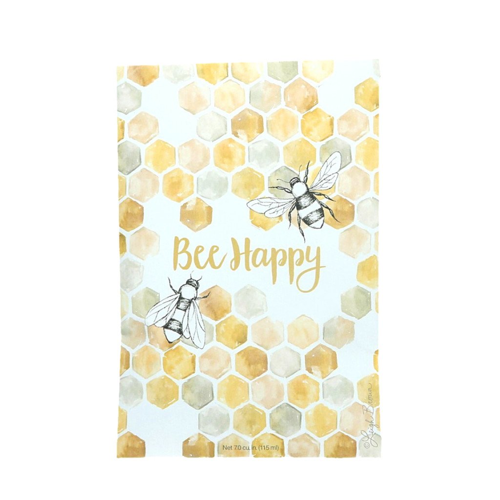A sachet packet with an image of hexagons linked together like a beehive.  Two drawings of bees are on either side of the text 'Bee Happy'