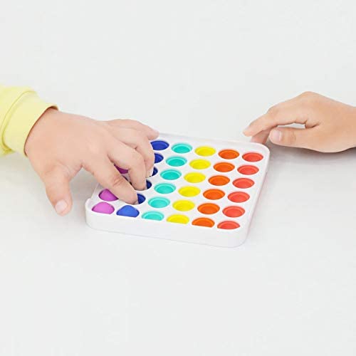 A square popper toy on a white background.  Each of the popper circles are in a column of a different color.  From left, Purple, Blue, Teal, Yellow, Orange, and Red.  Two Small hands are in the act of popping several of the dots.