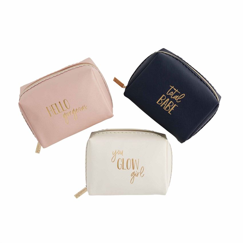 A photo of three square make up bags, each with a saying in gold on them.  From the left, the first is a blush color and says 'hello gorgeous',  the cream one in the middle says 'you glow girl,' and the one on the right is navy and says 'total babe,'