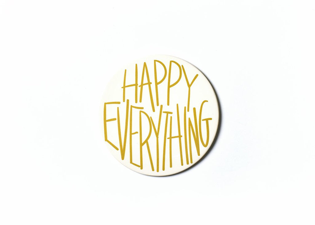 A round ceramic disc with the words 'Happy Everything' written in all capital letters in thin gold font.