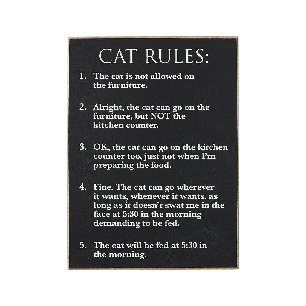 Black sign with beveled edge.  Sign reads 5 rules for owning a cat.
