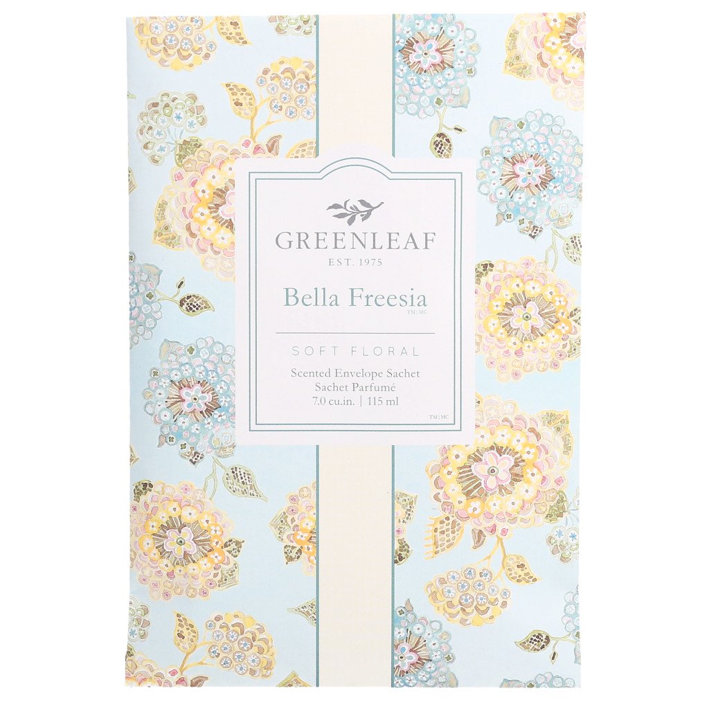 An image of a large sachet packet that has an overall pattern of blue and yellow flowers and a vertical cream colored band down the middle.  The label says 'Greenleaf Bella Freesia Soft Floral scented envelope sachet'