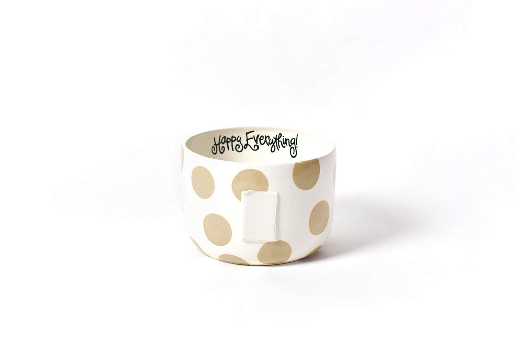 A large bowl on a white background.  The outside of the bowl is white with a series of large tan polka dots in a random pattern.  A large piece of velcro is mounted to the front to receive decorative attachments.  At the top of the inside of the bowl is a fun cursive font that says 'Happy Everything!' in black.  The inside of the bowl is white.