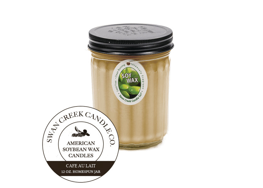 An image of a candle in a glass jar with a black lid.  The candle is light brown.  A graphic seal in front of the candle says 'Swan Creek Candle Co. American Soybean Wax Candles Cafe Au Lait 12 oz. Homespun Jar'.  The candle also has an ovular white label attached by a string wrapped under the lid.  The label has an image of green soybeans and says 'Soy Wax' along with 'Lead Free, intensely fragrant, clean burning'