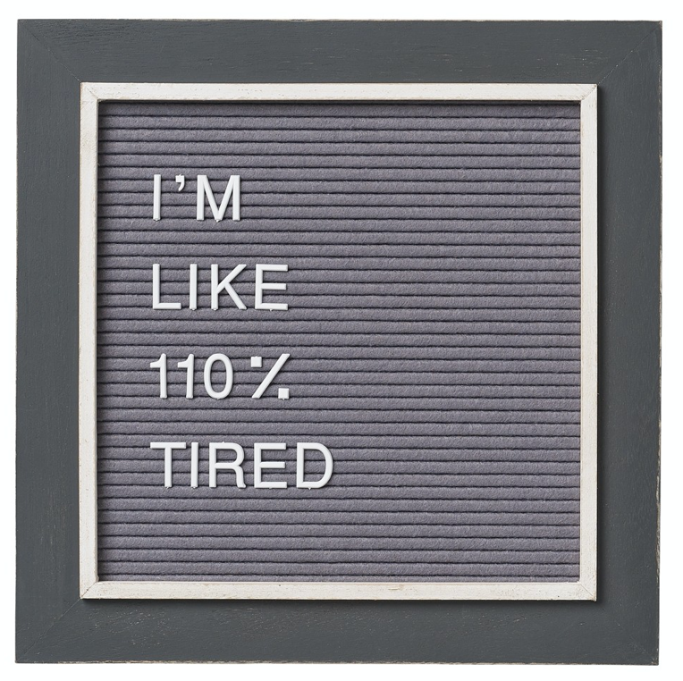 Dark gray framed sign, with inner light gray trim.  Middle of sign is a square of felt that adjustable letters can be arranged on.  Sample text says 'I'm like 110% tired"
