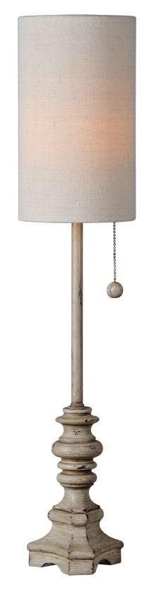 Buffet lamp with a cylindrical shade.  Stem and base are tan and lightly distressed.