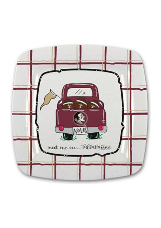 A square tray, with rounded edges, on a white background.  The tray is off white and features a plaid pattern of maroon and gold along the outer portion.  The center of the plate shows the back of a maroon pick up truck with footballs in the back, license plate says 'notes' and a gold flag sticking out the side.  The tailgate has the logo of the FSU college football team.  Below the truck it says 'meet me in...tallahassee'