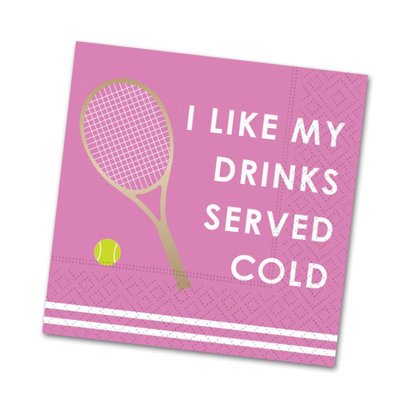 An image of a pink napkin with two white horizontal stripes on the bottom.  A gold foil tennis racket next to a tennis ball is adjacent to the text 'I Like My Drinks Served Cold'  