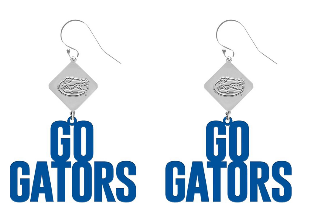 A pair of earrings on a white background.  Each earring features a diamond shaped silver pendant that has the UF gator engraved on it.  Dangling from the bottom of each diamond is flat text that says 'Go Gators' in blue.