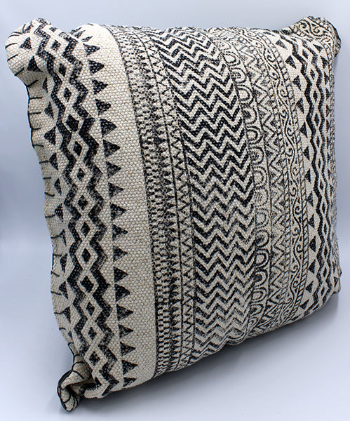 Hi textured off-white cotton pillow with gray printed multi-patterned design.  