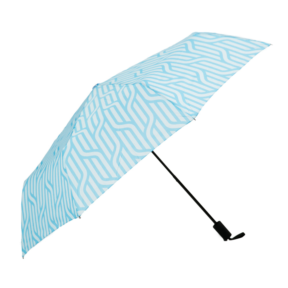 An open umbrella with repeating pattern of vertical lines that twist around each other reminiscent of a rope weave.