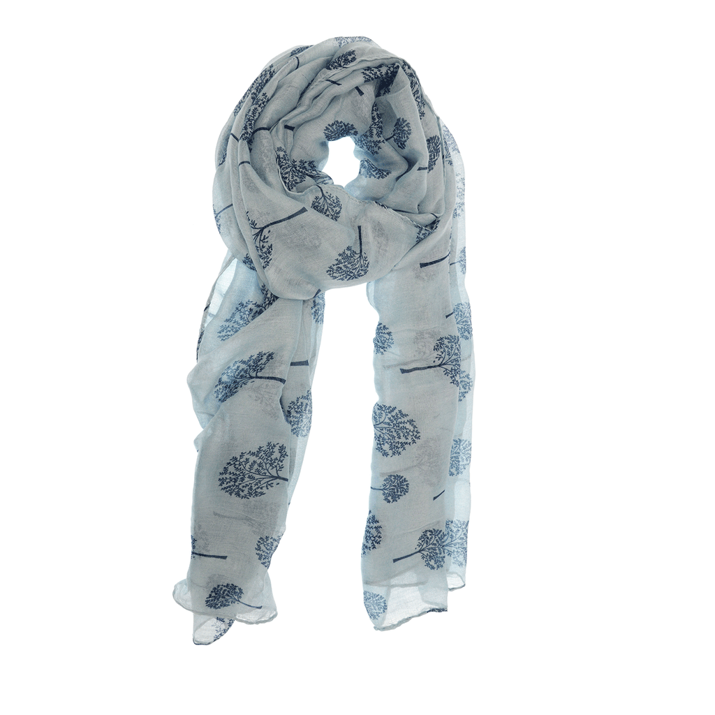 A light-blue chambray scarf with printed trees