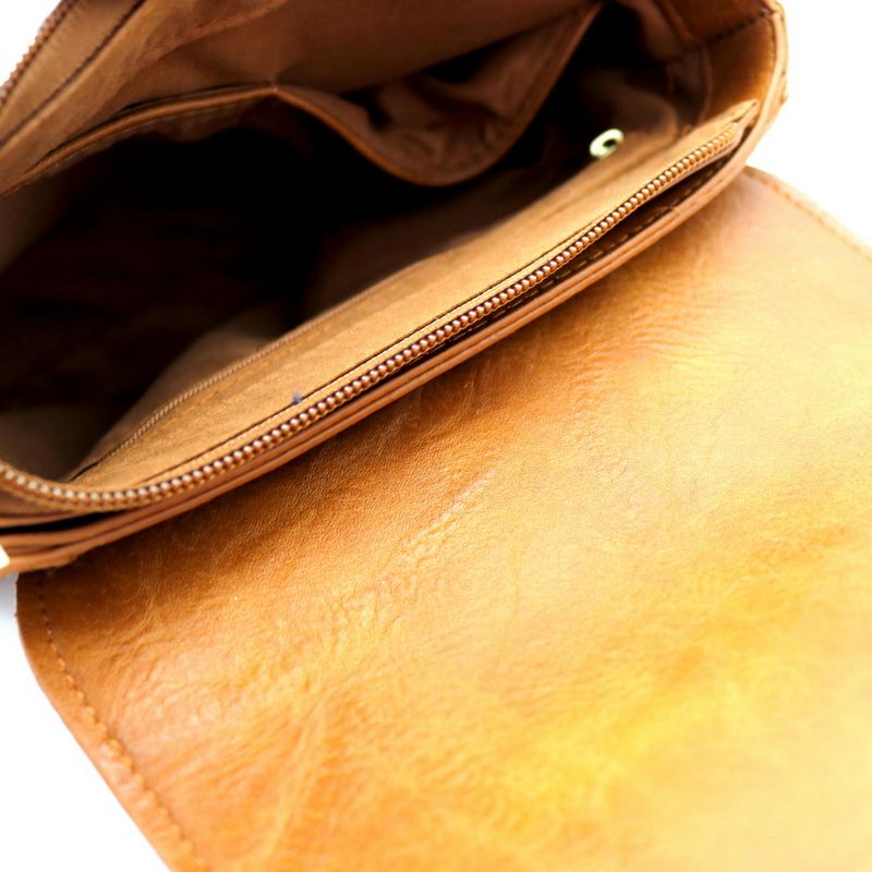 Inside of handbag showcasing pockets
