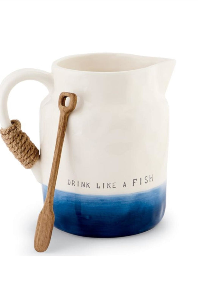 Hand-painted ceramic pitcher features debossed sentiment 'Drink like a FISH', wrapped jute rope handle and arrives tied with wooden stirring spoon.