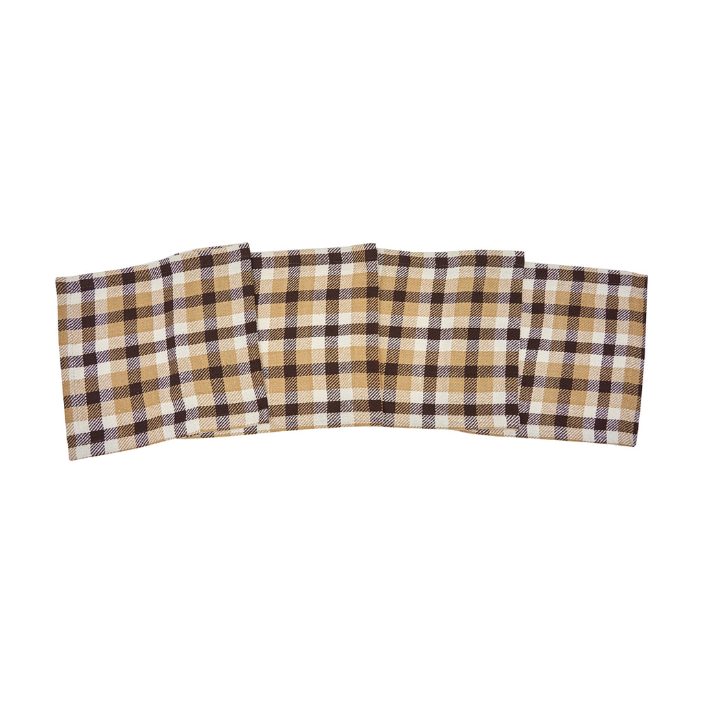 Plaid runner gently folded across the photo.  Plaid is tan, white and chocolate brown.