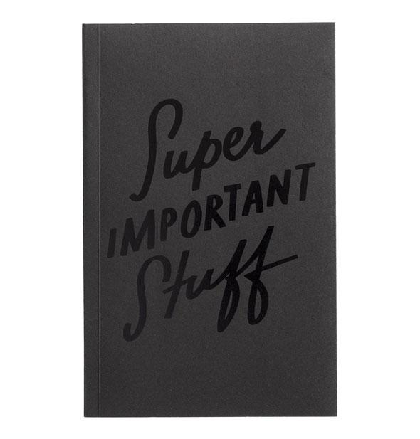 A gray soft cover journal with "Super Important Stuff" on the cover